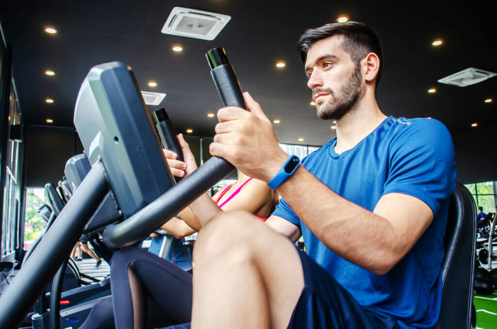 Man Exercising on a Recumbent Bike